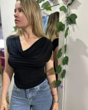 Blusa Caída.